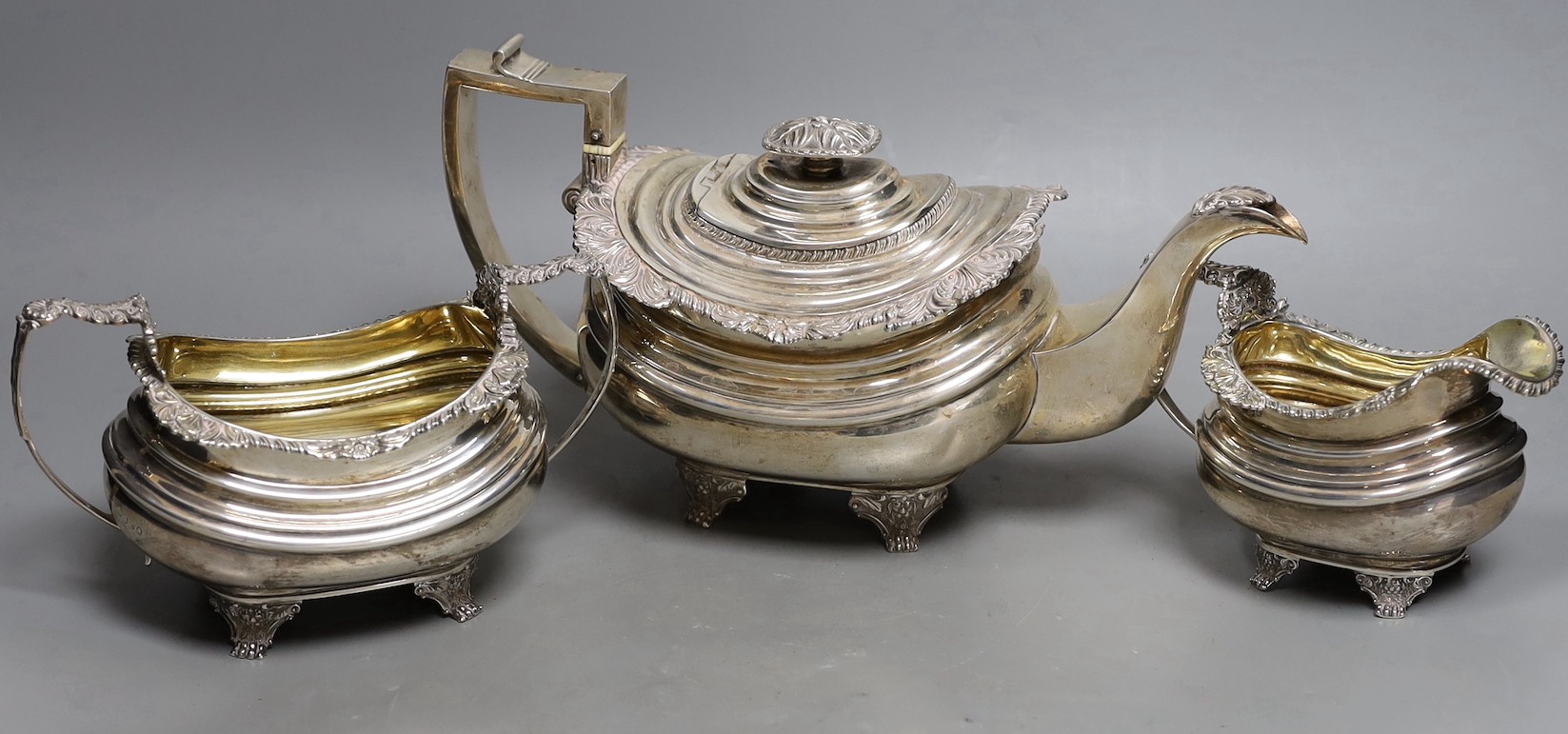 A George IV silver oval three piece tea set, by William Bateman, London, 1820/1/2, gross weight 41.8oz.